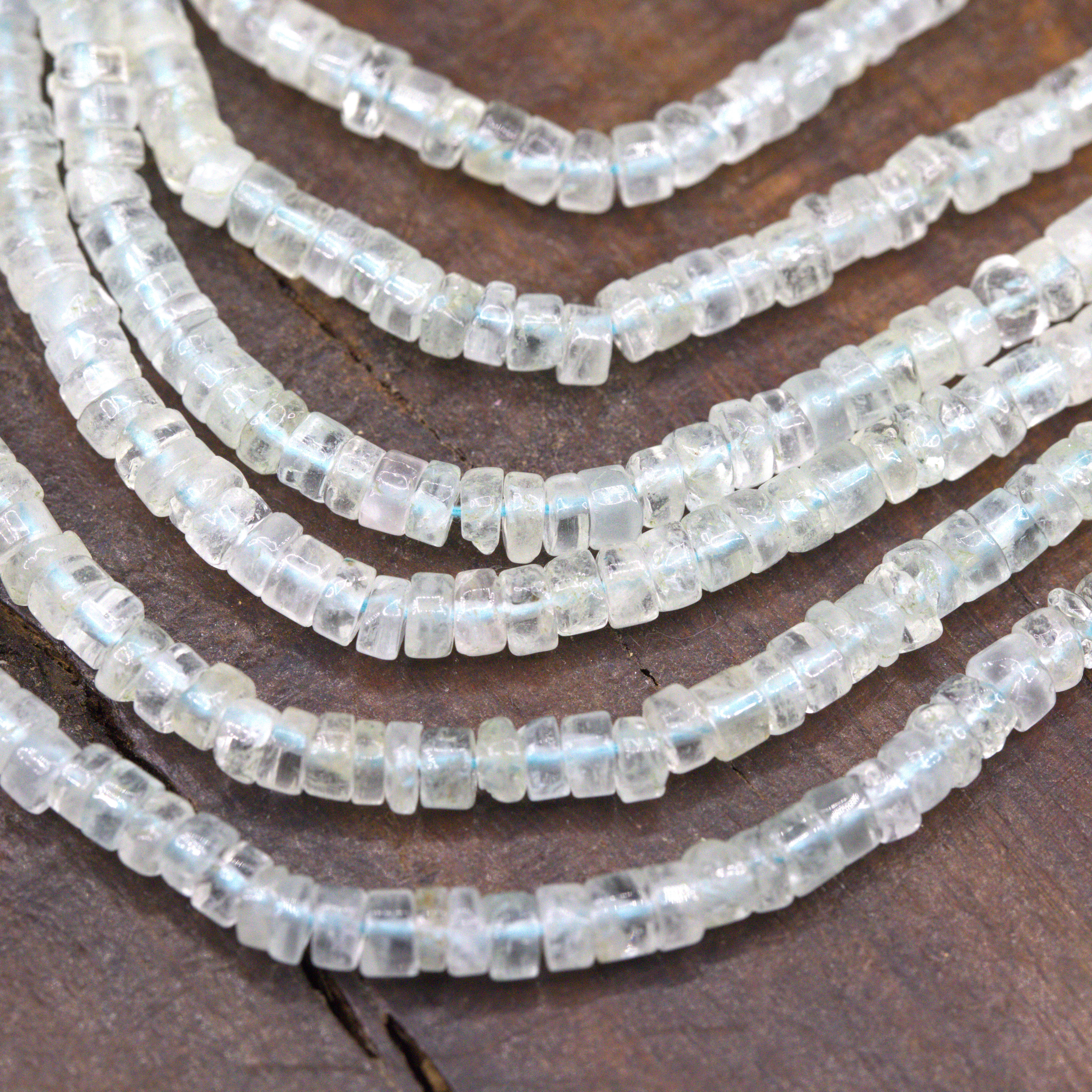 SI1096 Fluorit Perlenstrang unregelmäßige Rondelle 4-5 x 2-3 mm (ca. 33 cm Länge)