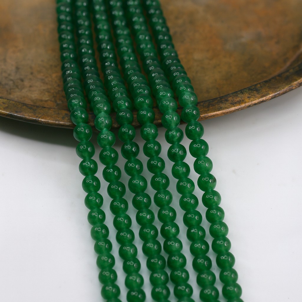 Grüner Aventurin Perlenstrang 5,4 - 5,5 mm unregelmäßige runde Perlen (ca. 35 cm Länge)