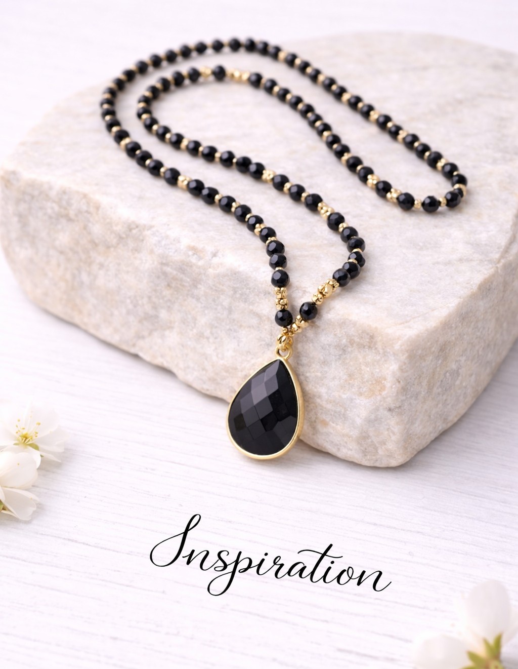 Natürlicher facettierter Obsidian Anhänger mit hell vergoldeter Metalleinfassung 29 x 19 x 7 mm