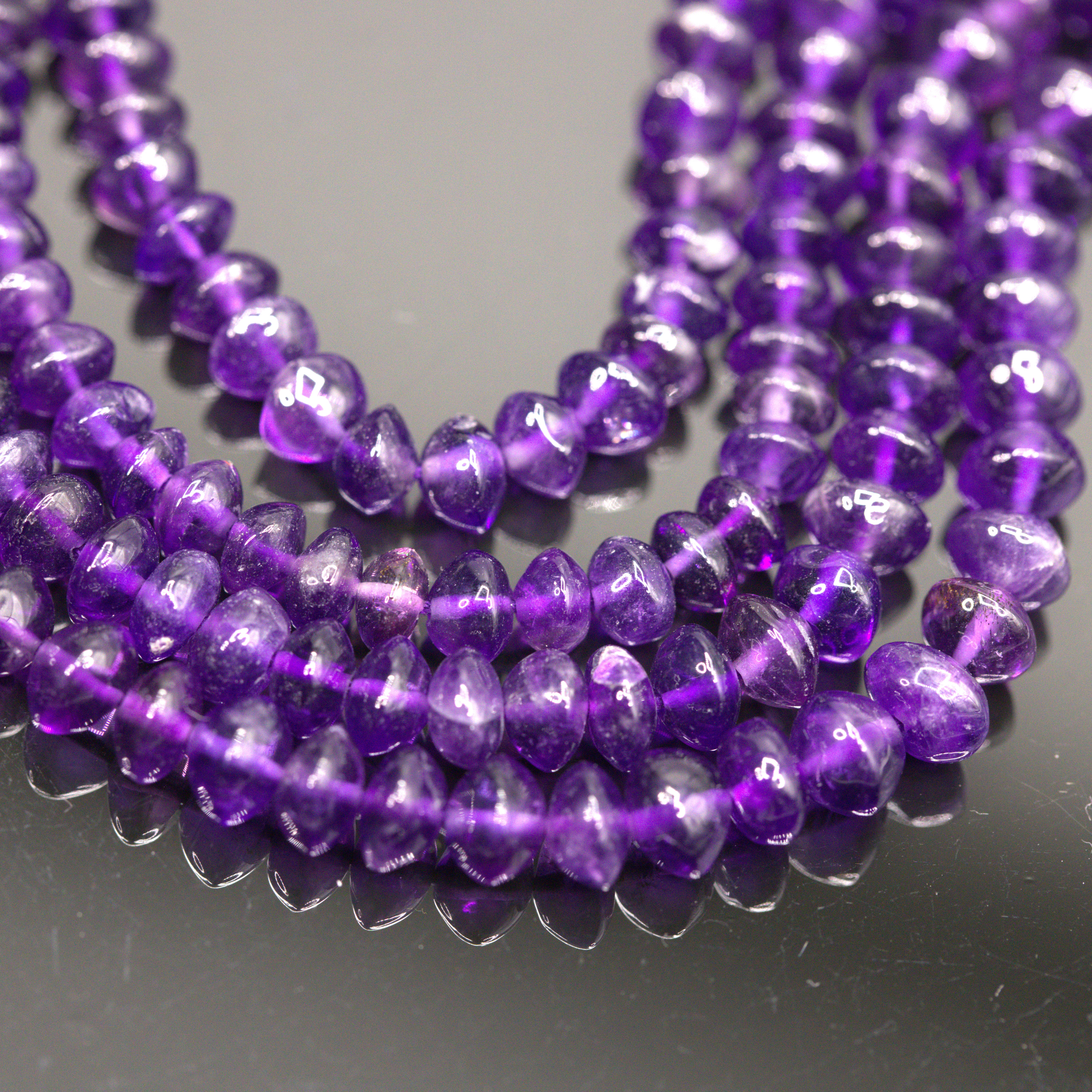 SI1124-3 Amethyst Perlenstrang unregelmäßige Rondelle 4-5 x 2-3 mm (ca. 33 cm Länge)