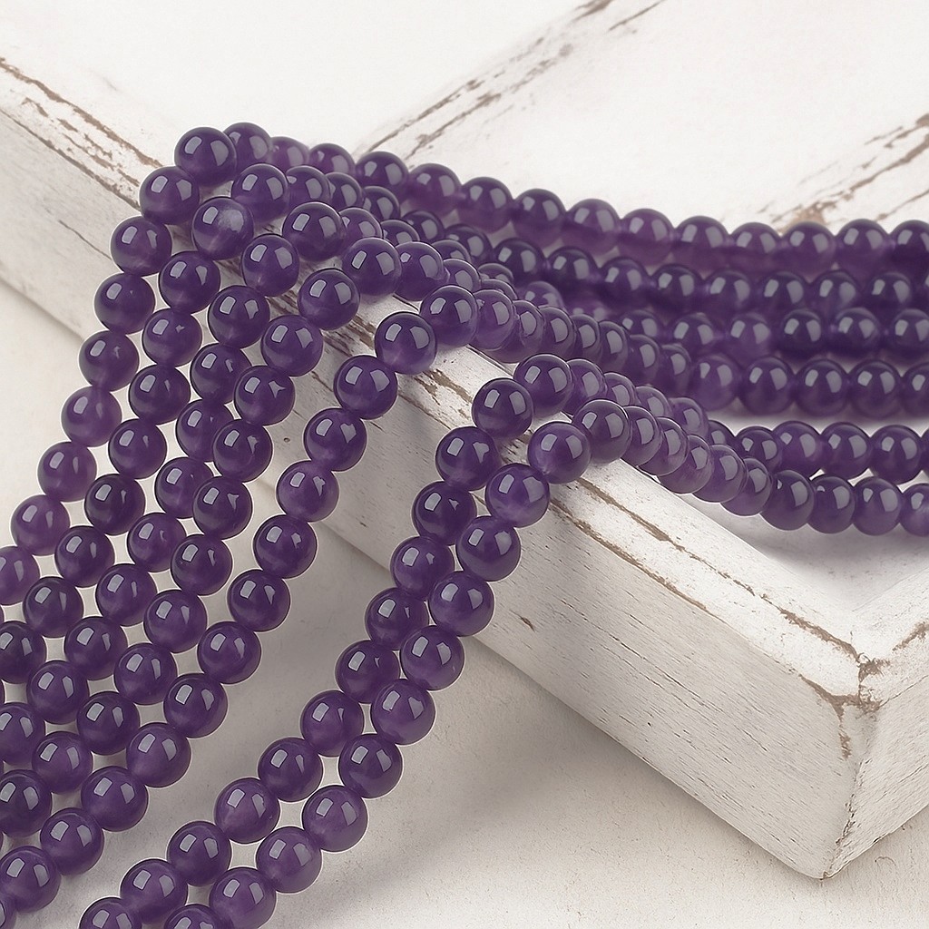 Amethyst Perlenstrang 6 - 6,2 mm Klasse AB rund (ca. 66 Perlen / ca. 38 cm Länge)