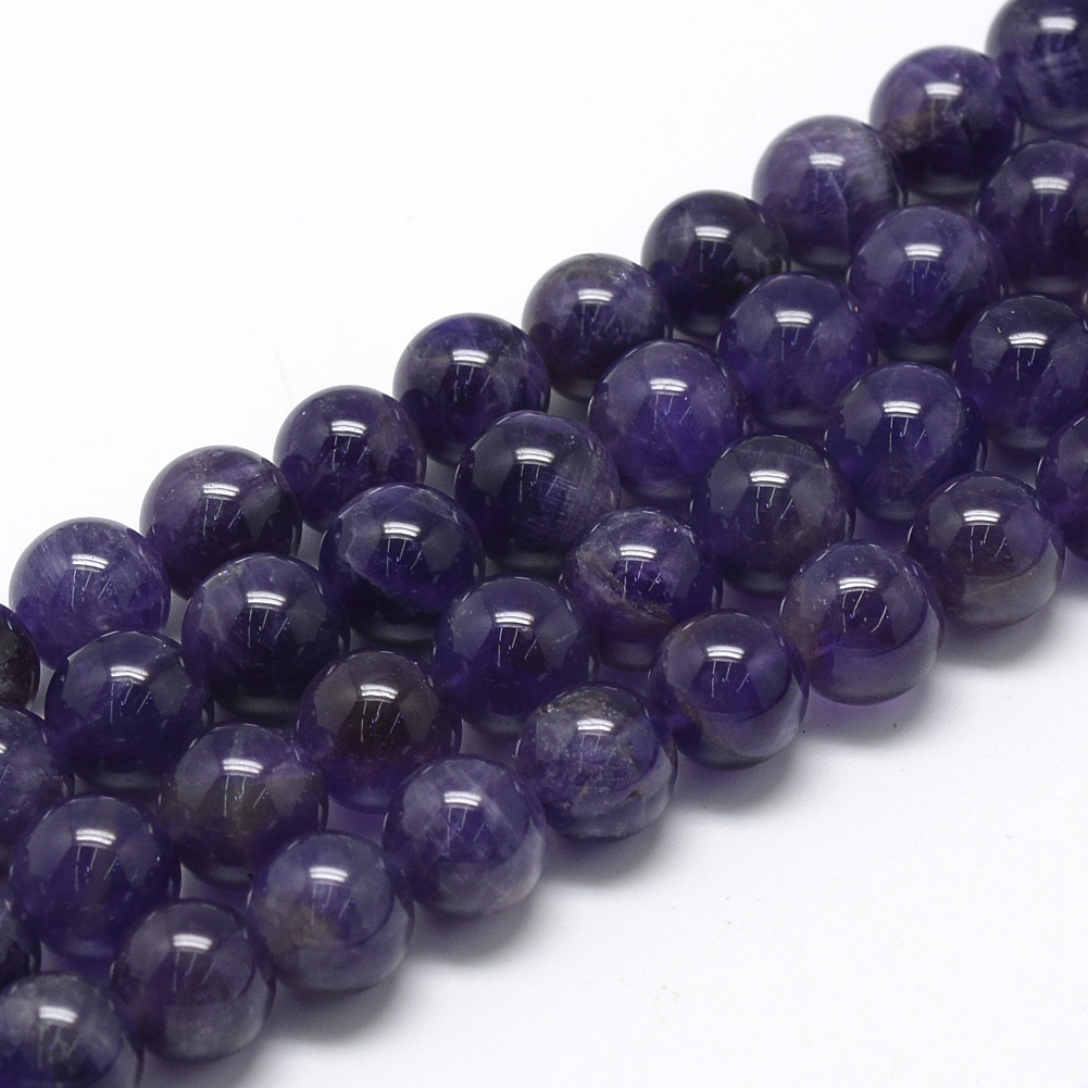 1018209d-c2d2-459b-a6de-5a4248e19838 Amethyst Perlenstrang 6 - 6,8 mm rund glatt glänzend (ca. 59 Perlen / ca. 39 cm Länge)