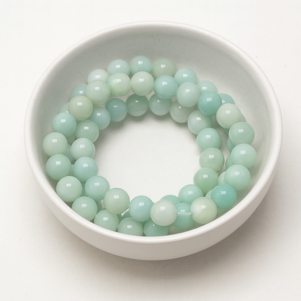 Natürlicher Amazonit Perlenstrang rund glänzend 6,5 - 6,7 mm (ca. 59 Perlen / ca. 38 cm Länge)