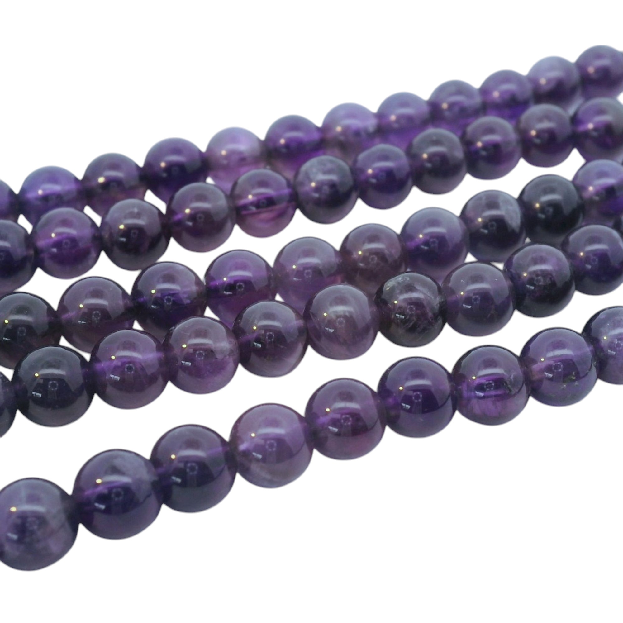 Amethyst Perlenstrang 6 - 6,5 mm rund (ca. 61 Perlen / ca. 39 cm Länge) Amethyst Perlenstrang 6 - 6,5 mm rund (ca. 61 Perlen / ca. 39 cm Länge)