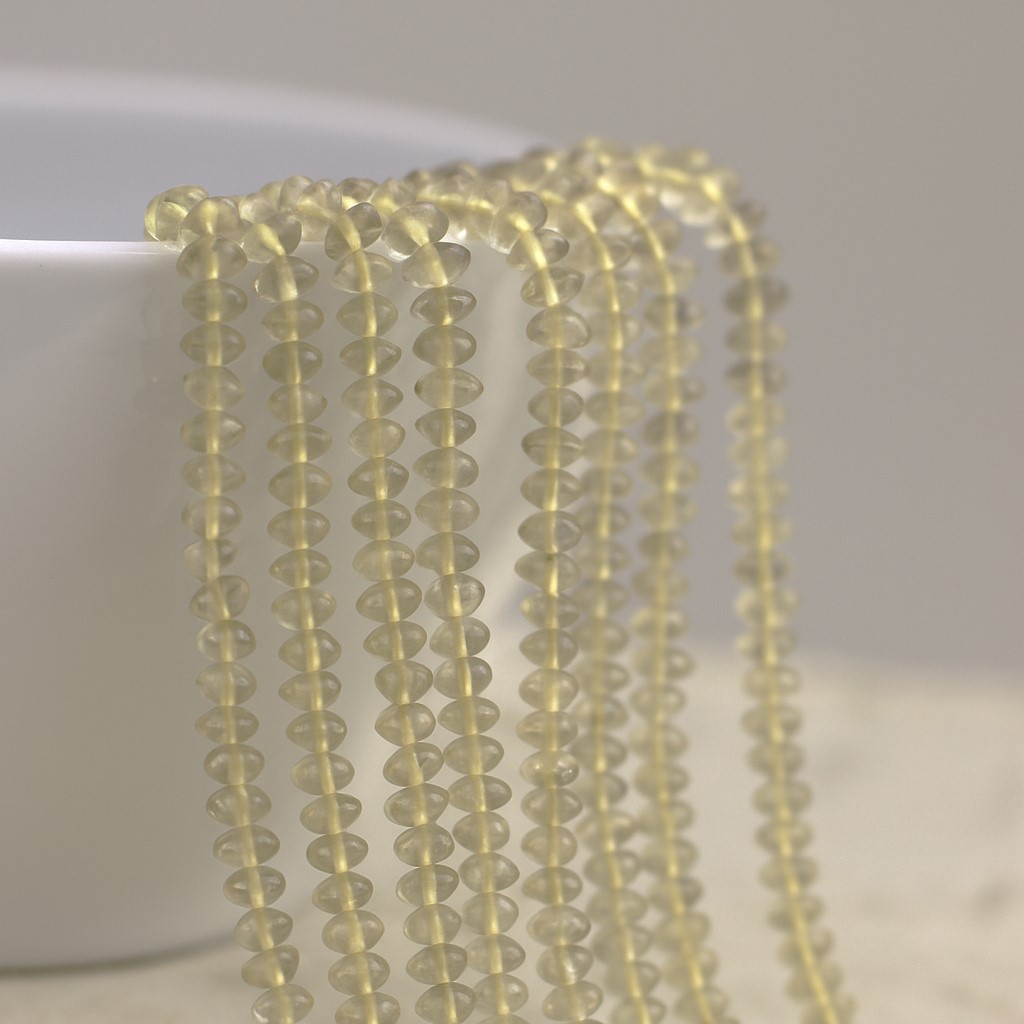 Prasiolith Perlenstrang 3 - 5 mm unregelmäßige Rondelle (ca. 35 cm Länge)