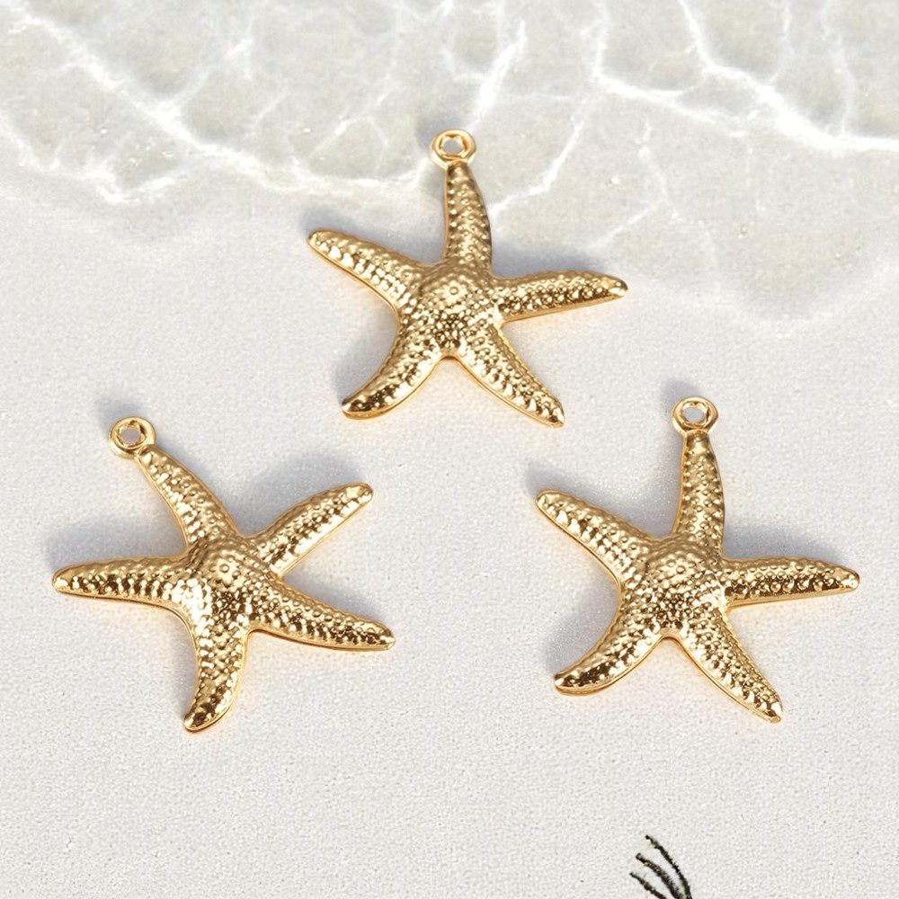 Seestern Charm Anhänger 18k vergoldet 22 x 20,5 x 2,5 mm Seestern Charm Anhänger 18k vergoldet 22 x 20,5 x 2,5 mm